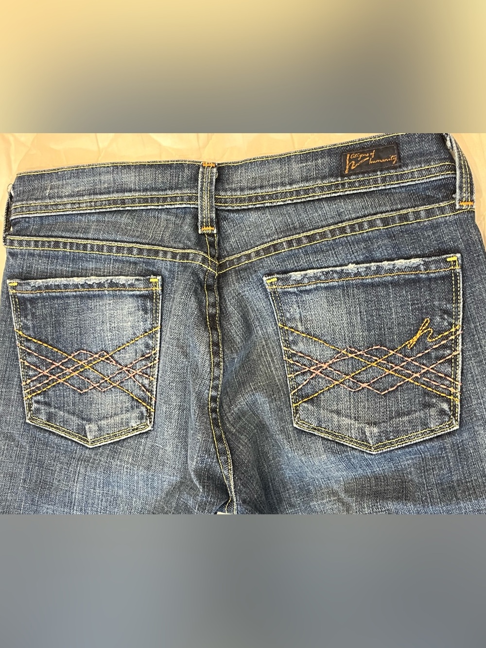 7 For All Mankind Blue Bootcut Jeans with Yellow Contrast Stitching